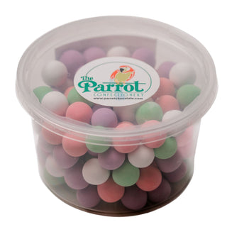 Clear container with pastel-colored candies and 'The Parrot Confectionery' logo on a white background