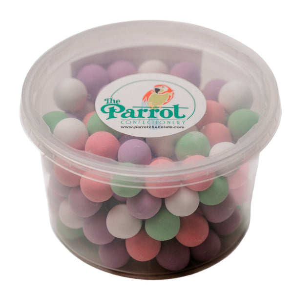 Clear container with pastel-colored candies and 'The Parrot Confectionery' logo on a white background