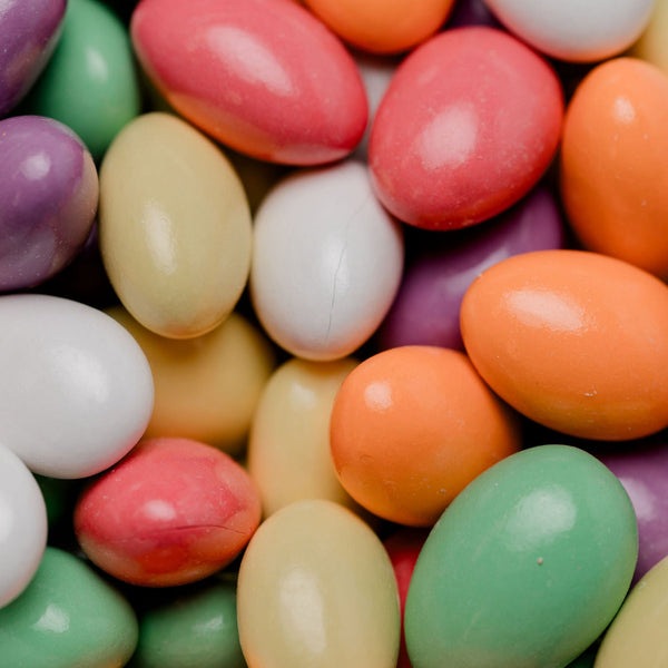 Assorted colorful candy in a container