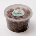 Container of brown candy with 'The Parrot' label on a white background