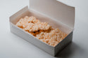 Box of peanut coconut brittle