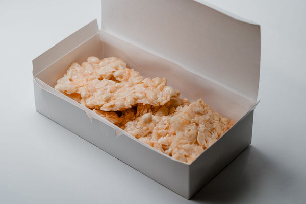 Box of peanut coconut brittle