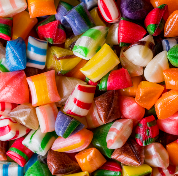 Assorted colorful hard candies in a pile